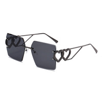Lunettes de soleil carrées sans monture avec découpe en forme de cœur 2024 Lunettes polyvalentes en métal pour femmes Logo Lunettes de soleil personnalisées