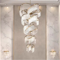 Lustre long en cristal de luxe pour escalier de duplex français, loft, hôtel, club, salle de banquet