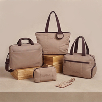 Sac de sport matelassé minimaliste personnalisé en usine, pochette à cosmétiques, ensemble de voyage de luxe, sacoche pour ordinateur portable, breloque