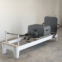Machine de Pilates Reformer en Bois Blanc Durable Personnalisée, Lit Multifonctionnel pour Entraînement du Core à Domicile et en Studio