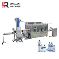 Línea de Embotellado de Agua Totalmente Automática 3 en 1, Sistema de Enjuague, Llenado y Tapado de Botellas PET con Control de Pantalla Táctil PLC