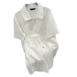 <strong>YZ</strong> Factory Wholesale Women White Embossed Print 2 Pieces Suit Women's Summer Loose Shirt and Shorts Set - Product Image 1