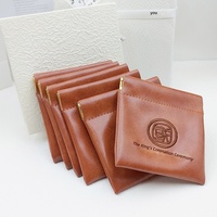 Pochette à monnaie en cuir PU en gros, fermeture à bouton-pression, mini sac de rangement à fermeture automatique, logo personnalisé en relief, style shrapnel en forme de noix pour bijoux