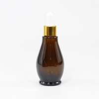 Flacon compte-gouttes d'huile essentielle de forme unique 10/20/30 ml, flacon de sérum avec bouchon doré, flacons compte-gouttes rechargeables pour emballage cosmétique