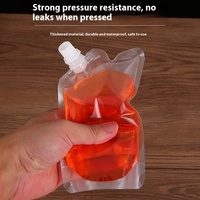 Vente en gros plastique transparent jetable boisson Whisky lait thé café boisson jus eau liquide pochette de voyage portable à bec verseur