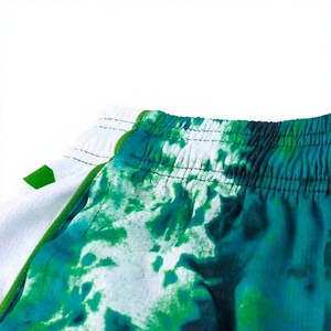 Ensemble de maillot de basket sublimé pour homme, vert tie-dye, débardeur sans manches avec short à taille élastique, évacuation de l'humidité, athlétique. - Product Image 5