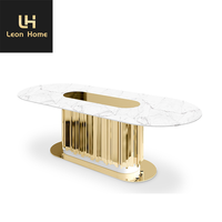 Table à manger de dernière génération avec design en acier inoxydable, plateau en marbre, ensemble de table à manger de luxe avec chaises, meubles
