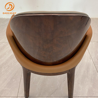 Chaise de salle à manger en cuir PU au design luxueux, structure en tube métallique, mobilier de restaurant moderne, chaise de salle à manger en bois gris pour hôtel