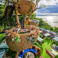 Outdoor Rotes Vogelnest-Sitzkissen Rattan-Sofa Modernes Schlichtheit-Design für Restaurant, Aussichtspunkt und Ferienhaus-Nutzung