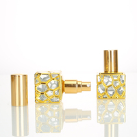 Venta al por mayor personalizado 10ml exquisita botella de spray de perfume de oro cuadrado de lujo de gama alta de estilo árabe botellas de vidrio vacías Attar