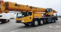 Grue de camion hydraulique QY70 70T avec force de stabilisation de 579 kN pour la construction et les levages lourds en Algérie avec certification CE