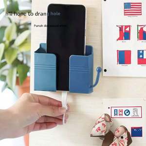 Soporte de pared sin perforaciones para teléfono móvil, control remoto y carga, estante fijo de plástico para cabecera, ideal para herramientas. - Product Image 1