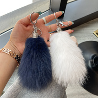 En gros, Porte-clés pendentif en peluche queue de renard, boule lumineuse douce, pour clés de voiture, voitures électriques et accroche-sac