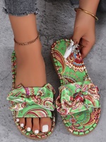 Sandales plates décontractées pour femmes, tendance mode, avec empeigne en toile imprimée, bout ouvert, semelle en caoutchouc antidérapante et nœuds, pour l'extérieur, vente en gros