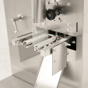 Chine dernière conception <span class=keywords><strong>pas</strong></span> <span class=keywords><strong>cher</strong></span> petit sachet de miel rond sachet de thé prix de la machine à emballer pour les pièces de rechange de la petite entreprise - Product Image 4