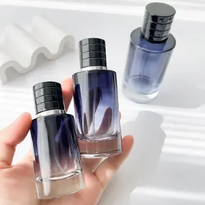 Pulvérisateur cylindrique dégradé bleu foncé clair et couvercles noirs bouteille en verre vide bouteille de parfum transparente de 50ml