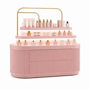 Comptoir de présentation de cosmétiques ovale rose avec éclairage LED, vitrine en îlot à niveaux et cadre en arche dorée pour magasin de parfums - Product Image 1