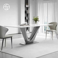Ensemble de table à manger rectangulaire de luxe moderne avec 4 chaises, capacité de 6 personnes, pour la maison, l'hôtel ou la villa, plateau en pierre frittée, design contemporain