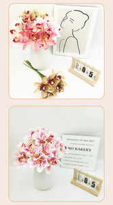 D449 Venta al por mayor de flores artificiales hechas a mano de seis cabezas Huilan para fotografía transfronteriza, accesorios para decoración del hogar de Año Nuevo - Product Image 4