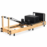 Reformer Pilates pliable en bois d’érable avec pieds réglables Machine de fitness professionnelle pour studio et maison