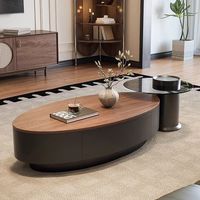 Table basse ovale moderne haut de gamme couleur noyer, design épuré et élégant pour salon, petit appartement, forme spéciale