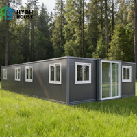 Maison préfabriquée en conteneur d'acier extensible sur mesure de 20 pieds, 40 pieds, 30 pieds, villa de luxe portable à 2-5 chambres en panneaux sandwich