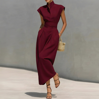 Robe midi élégante sans manches pour femme, avec poches, col montant, taille haute, coupe ajustée, idéale pour le bureau, les sorties et les tenues professionnelles.