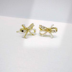 custom 925 plata sterling silver Cute Bowknot Stud earring summer 2026 unique ladies gold plated korean elegant pearl earrings - Product Image 1