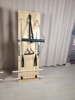 Tour de Pilates murale de qualité professionnelle avec barre de descente et ressorts robustes pour clinique d'exercices