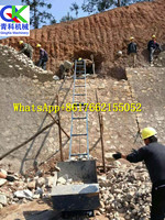 Machine de levage pour chantier de construction, transporteur de matériaux pour pente inclinée, protection de pente inclinée pour autoroute