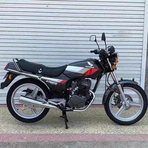Moteur bicylindre rétro d'occasion pour moto Wang 125cc, modèle WH110T-2A, authentique et importé de Chine continentale, idéal pour les trajets quotidiens. - Product Image 1