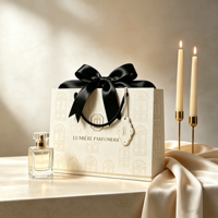 Sac en papier crème de luxe avec logo personnalisé et grand nœud en ruban noir pour emballage cadeau de parfums et cosmétiques haut de gamme, sac de shopping