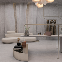 Ropa de moda personalizada, muebles de boutique, estante de exhibición de ropa, Mostrador de isla central de mármol