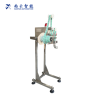 Machine d'insertion de sac déshydratant NY-857 pour la ligne de production de codage d'étiquetage de capsulage de cachetage de remplissage de tasse de bouteille