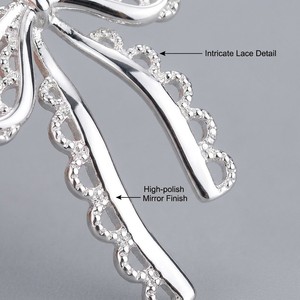 Pendientes de aro con lazo de encaje esculpido en 3D, chapados en oro real, ecológicos, 'Graceful Knot' de JinSpark - Product Image 2