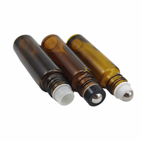 Vente en gros de bouteilles à rouleaux en verre transparent de 8ml 10 ml avec inserts en rouleau de verre et bouchons noirs blancs