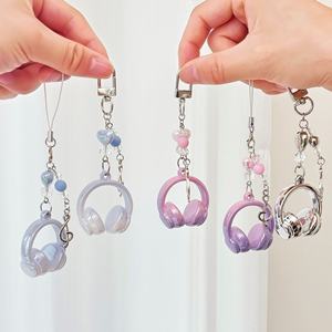 Llavero de coche para chicas a la moda, pequeño dije de notación musical, bonito llavero de acrílico con auriculares para mujeres, hombres, regalo para fanáticos de la música - Product Image 1