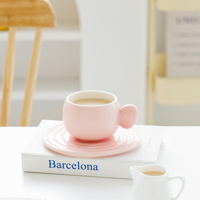 Matte pink milk ring coffee cup and saucer