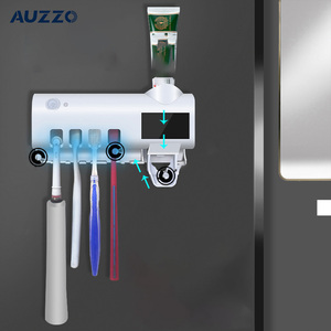 Soporte de pared inteligente para cepillos de dientes con esterilizador UV, dispensador automático de pasta de dientes sin perforaciones, organizador de baño para uso familiar - Product Image 5
