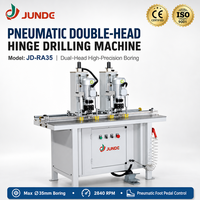 Machine de perçage pneumatique JUNDE à double tête de haute précision pour la fabrication de trous de charnières de portes d'armoires en bois