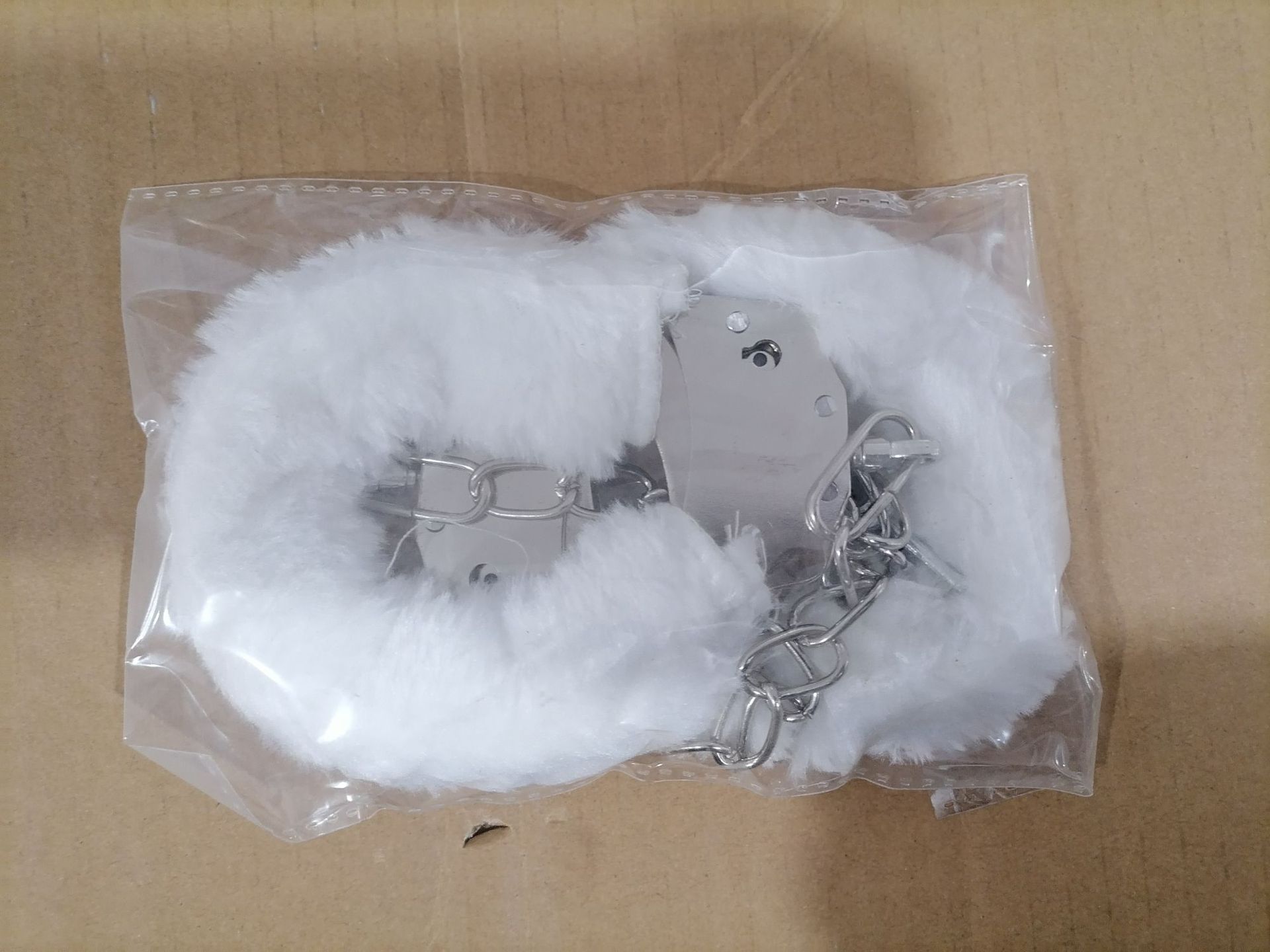 Pieds en peluche blanche