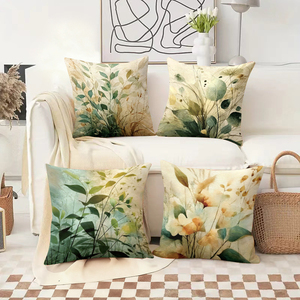 수채화 식물 그림이 그려진 장식 쿠션은 아늑한 소파를 장식하고, 배경에는 축제 분위기의 양말과 사슴 뿔이 있습니다. - Product Image 2