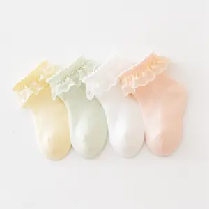 रंगीन पतले एंटी-स्लिप ग्रिप मोज़े नवजात शिशु लड़की के लिए सांस लेने योग्य एंटी-बैक्टीरियल लोगो डिज़ाइन बुना हुआ ट्यूब स्प्रिंग कॉटन थोक विक्रेता