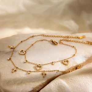 Pulsera de aleación de zinc con forma de corazón, cruz y diamantes incrustados, ideal para regalo. - Product Image 3