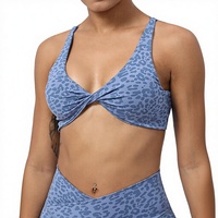Nouveau haut de yoga pour femme à imprimé léopard avec dos torsadé, respirant et offrant un maintien élevé pour le fitness en extérieur
