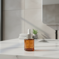 30ml Runde Glas-Tropfflasche mit Flacher Schulter, Silbernem Verschluss, Bernsteinfarben oder Transparent, mit Individuellem Logo-Siebdruck