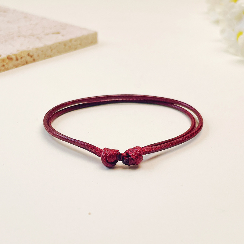 Corda intrecciata in cera color rosso mattone