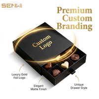 Boîte cadeau en carton rigide noir mat avec logo personnalisé imprimé et estampage à chaud doré pour chocolat