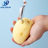Multifunctionele herbruikbare draagbare roestvrijstalen handmatige boogvormige fruit-, aardappel-, appel- en groenteschiller voor thuisgebruik in de keuken