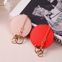 Miroir de maquillage rond en cuir PU avec porte-clés, mini miroir cosmétique portable, miroir de poche tendance pour femmes, cadeau